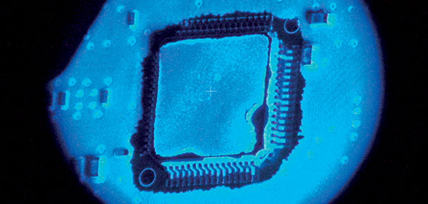 UV illumination of PCB surface mount component